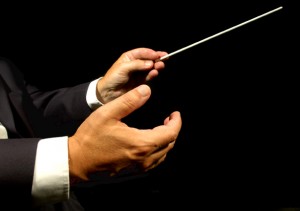 Conductor Conducting the Symphony of Shoulds