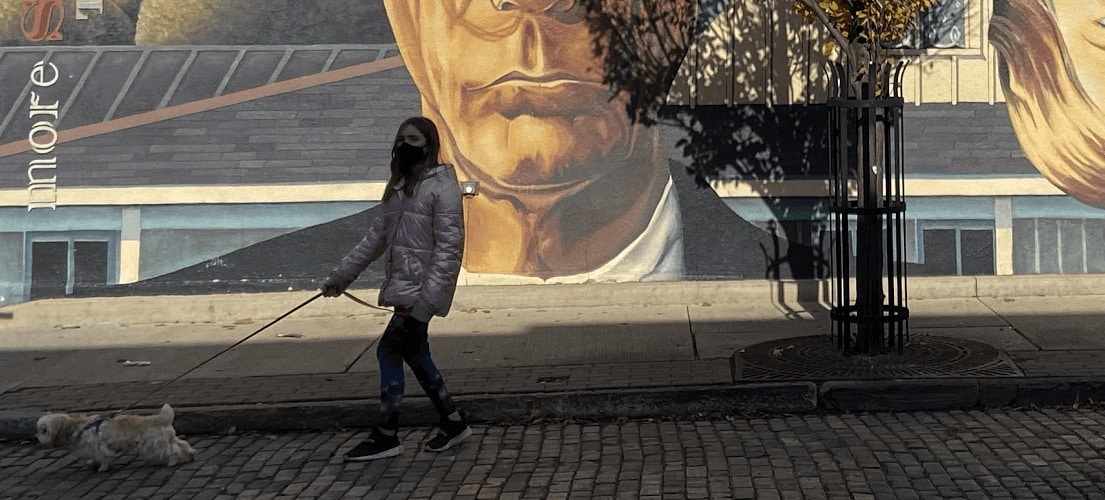 Girl Walking a dog