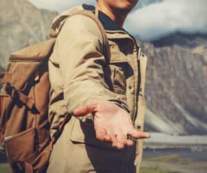 Man with his hand out