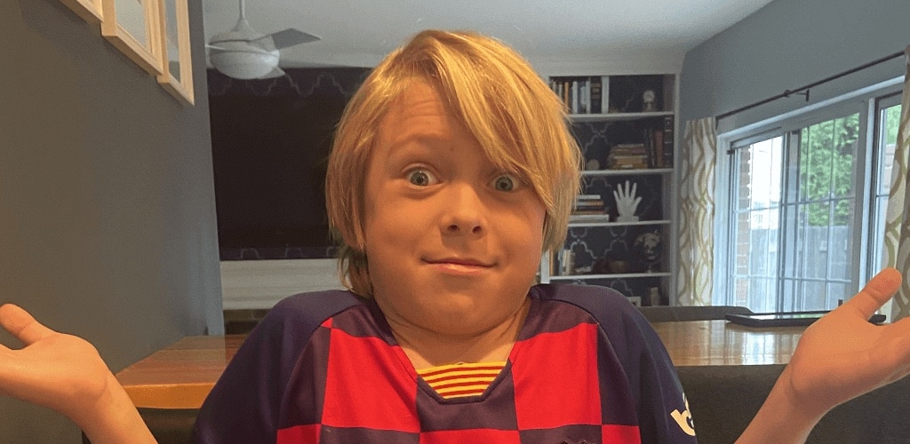 little boy shrugging I don't know