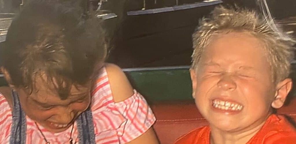 Boy and girl on a roller coaster