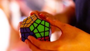 hands playing with a puzzle