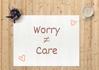 Image showing the wording 'worry isn't the same as care' on a piece of paper.