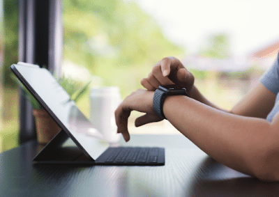 Image showing someone checking their smartwatch.